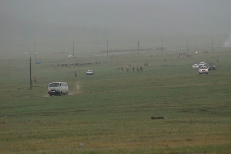 Racers coming in; rain stopped shortly after I took this picture