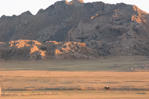 BGC-horse-and-rider Horse and rider, early evening, Baga Gazriin Chuluu Nature Reserve