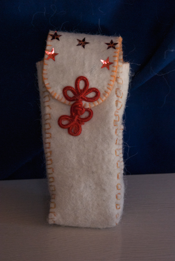 Eyeglass case; closure and stars from notions and extra craft things I brought as gifts