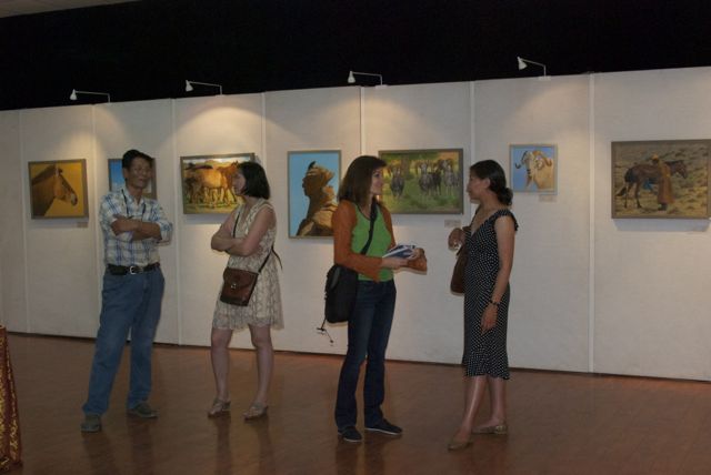 OIdoviin Magvandorj, unidentified woman, journalist Michelle Tolson, activist Aldraa