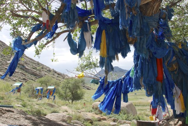 Khadag and prayer wheels
