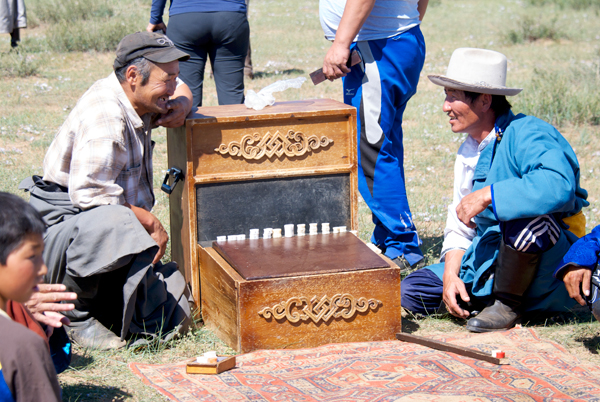 The target...stacked sheep's anklebones; if hit they fall off the back into the box