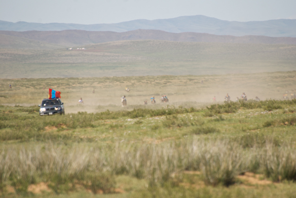 At last the horses and riders come back into view