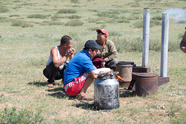 Our drivers, Batmaa and Sendag, helped with the real Mongolian BBQ....khorhog (mutton or goat cooked in the metal containers)