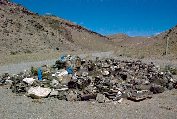 Between two lanes at a high points was this ovoo.