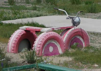 Playground tricycle made from old tires; Bayan-Ulgii, western Mongolia, 2015