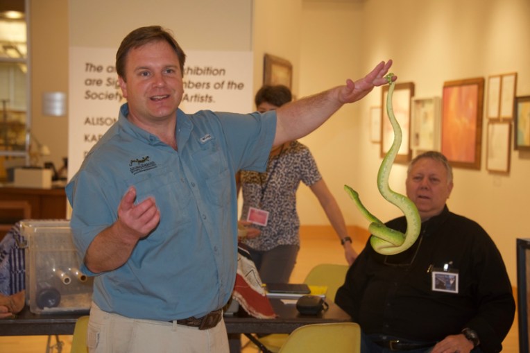Chris Evers of Animal Embassy and green tree snake